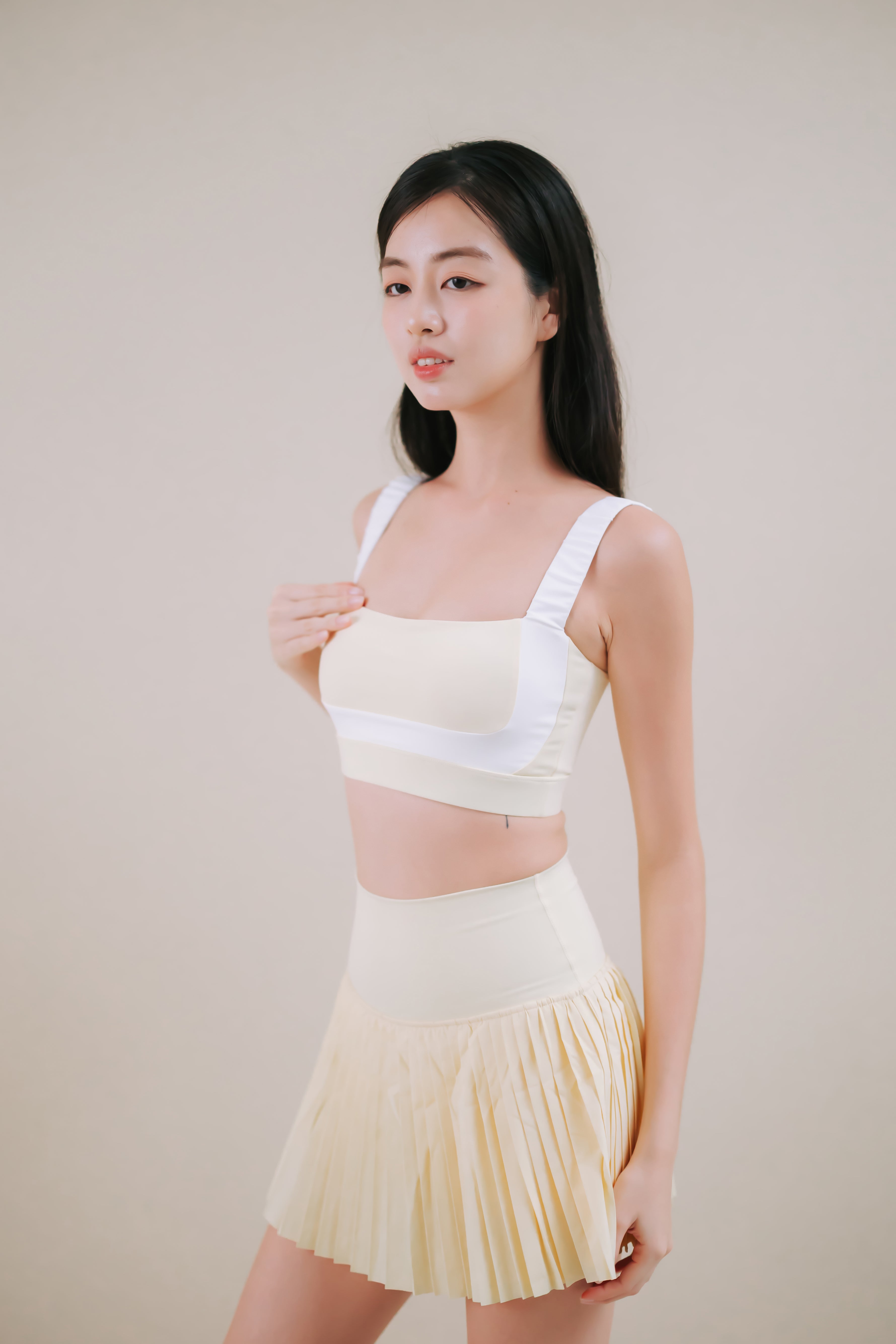 Hera Cloud Ruched Butter Lemon Sports Bra