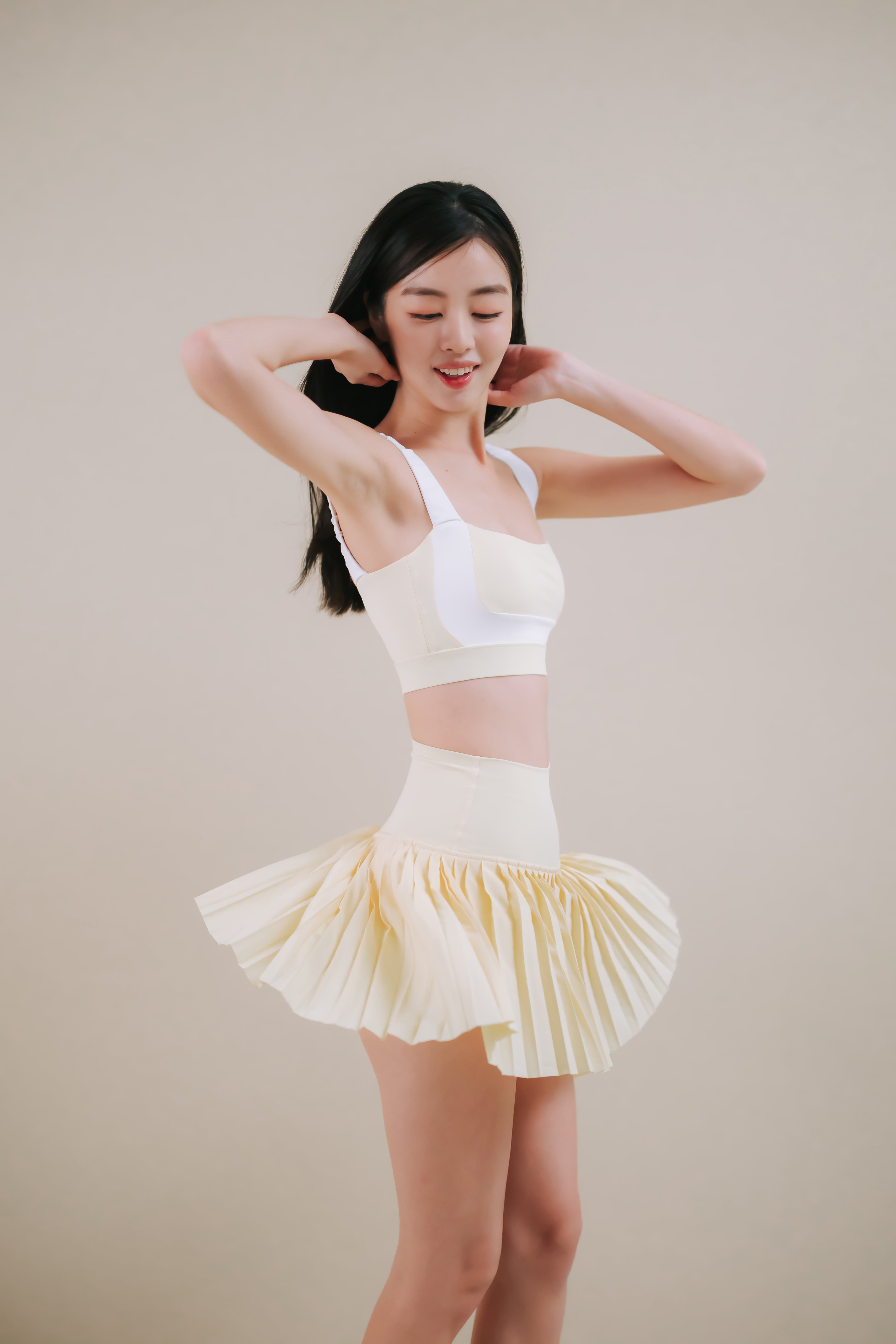 Hera Lemon Butter Pleated Tennis Skirt